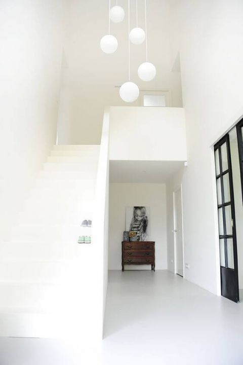 Ruimtelijkheid door vide in inkom